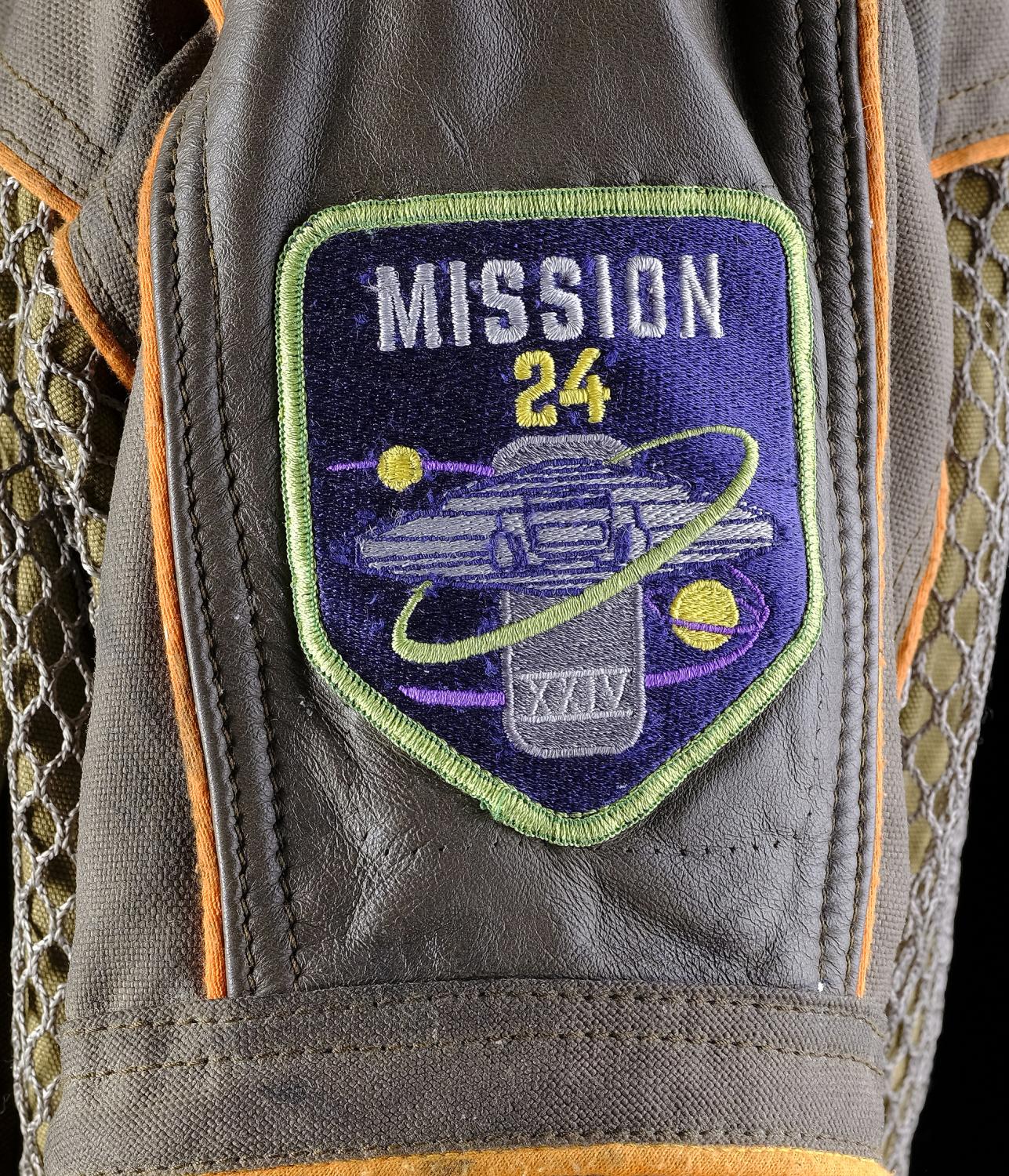 john-robinson-and-maureen-robinson-stunt-cold-weather-jackets-with-mission-24-patches