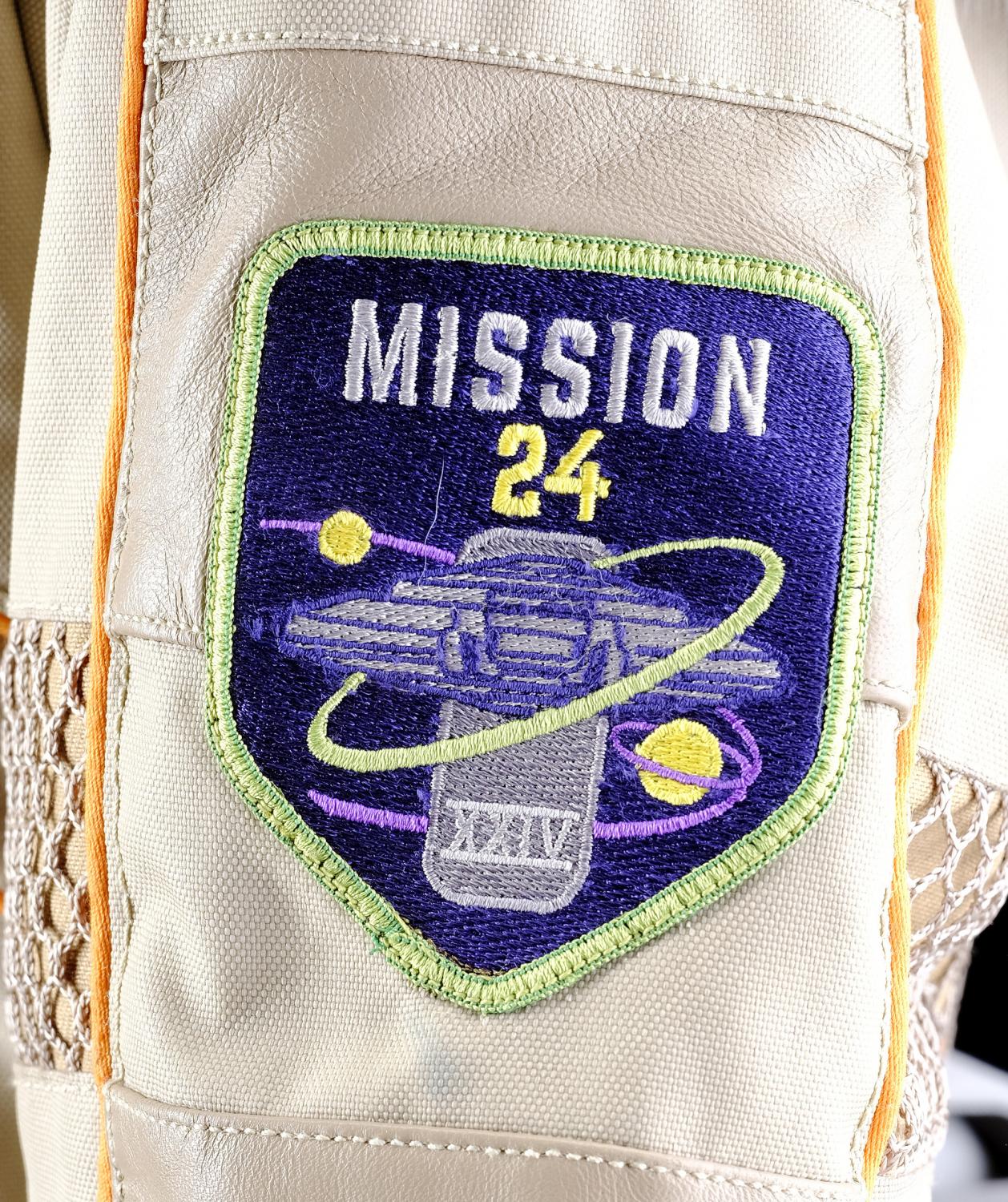 judy-robinson-spacesuit-under-layers-and-boots-and-accessories-and-cold-weather-jacket-with-mission-24-patch
