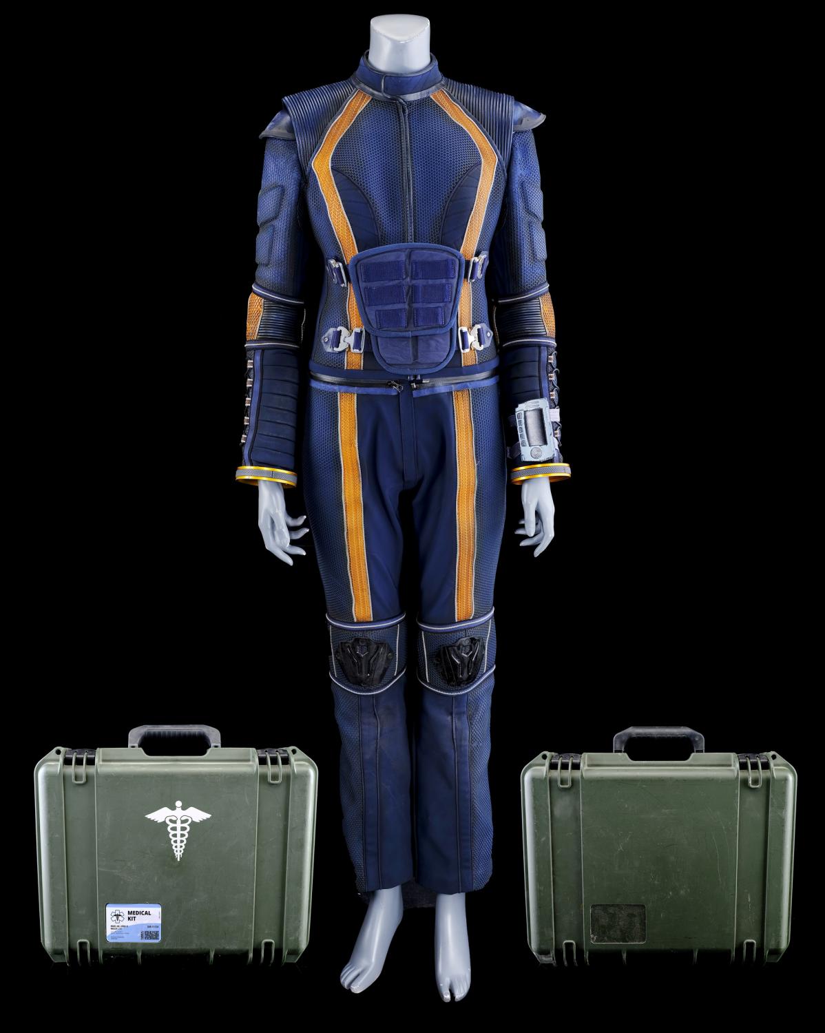 judy-robinson-spacesuit-under-layers-with-wrist-communications-device-and-medical-cases