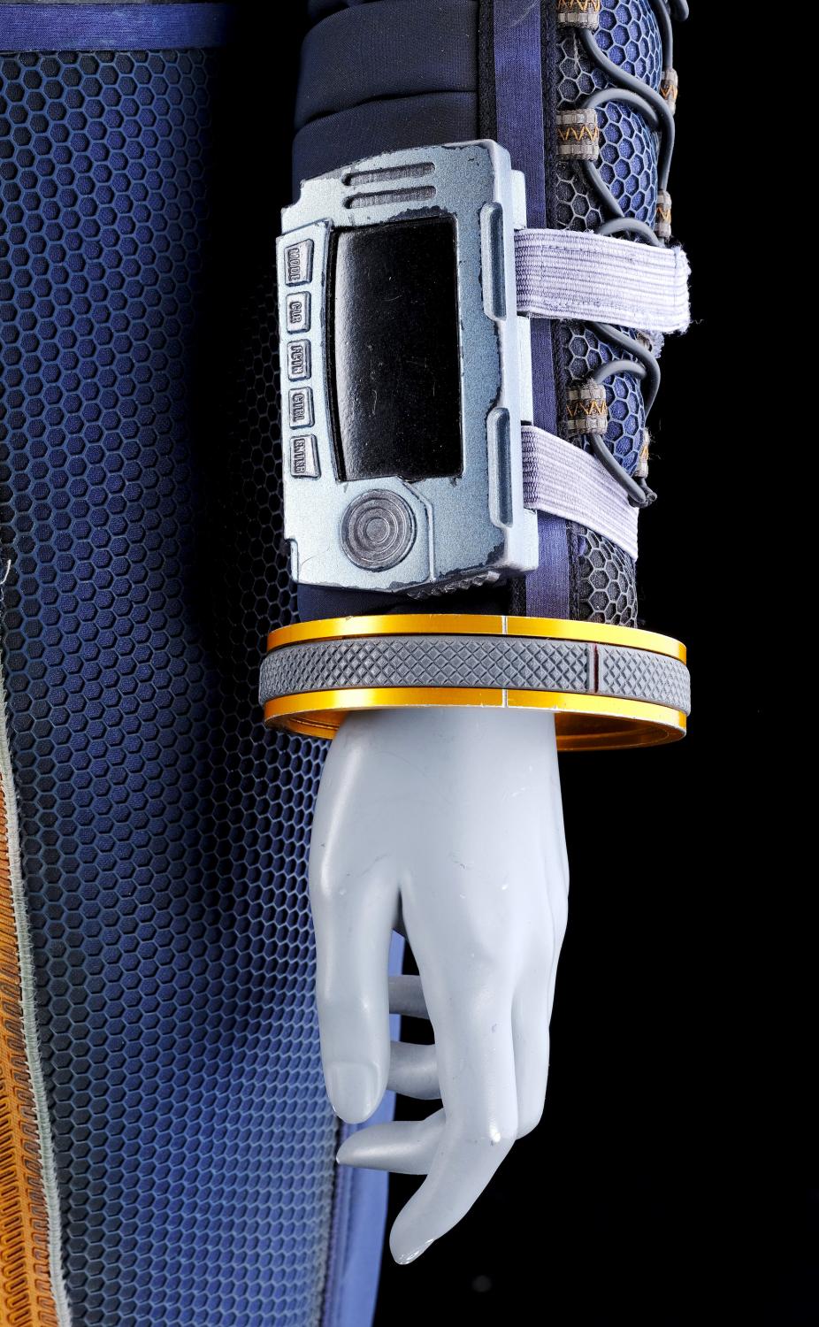 judy-robinson-spacesuit-under-layers-with-wrist-communications-device-and-medical-cases