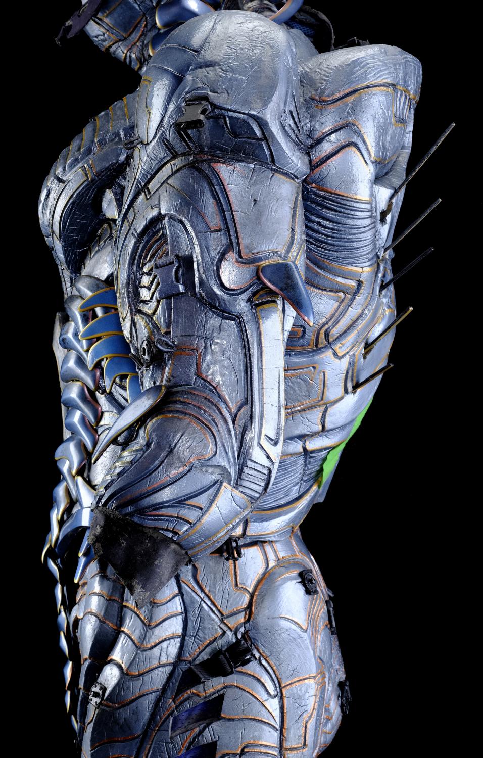 robot-alien-bodysuit-with-partial-scales-and-stand-in-head-and-and-insert-arm